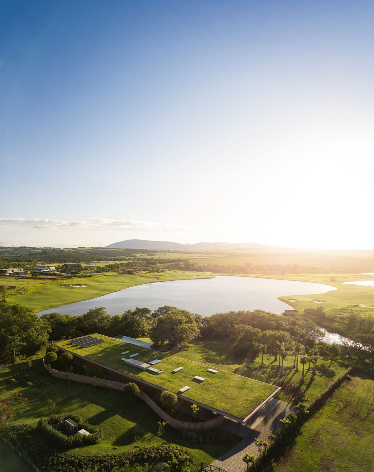 Studio MK27 completes Planar House with extended green roof outside of São Paulo
