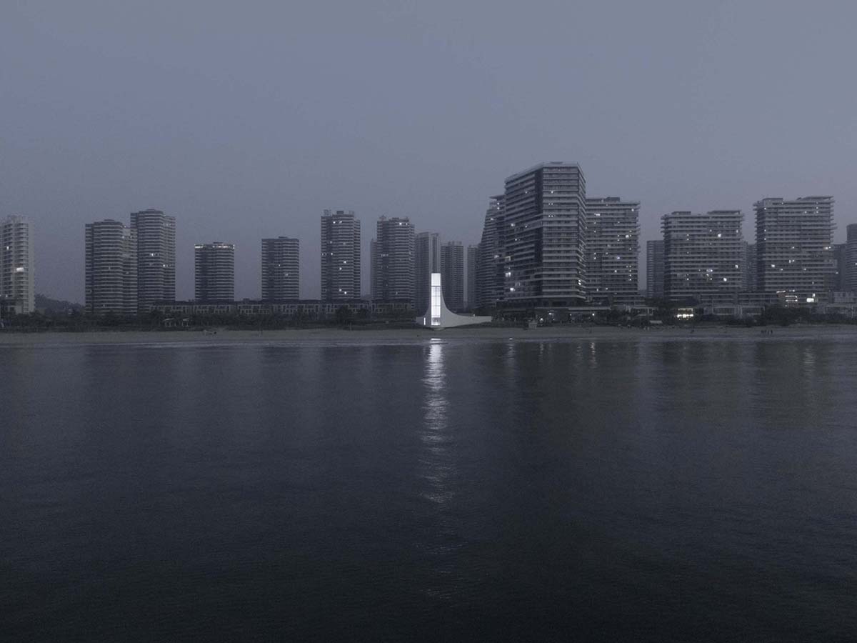 O-office Architects designs curvy chapel that opens up a vertical window to the seaside in Shanwei