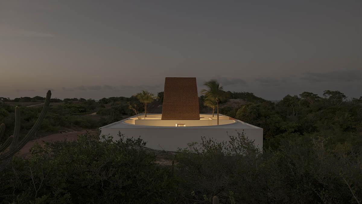 Atelier Matteo Arnone adds spacious brick tower to holiday home in Brazilian forest