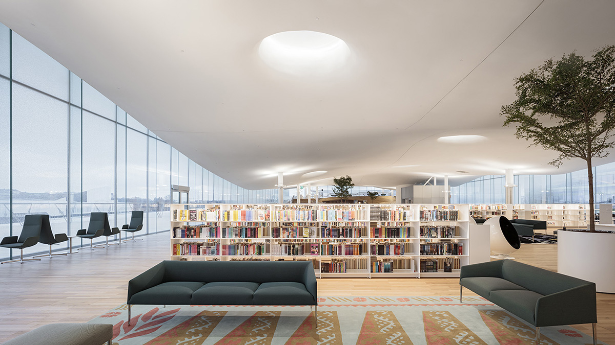 ALA Architects' cloud-like Oodi Helsinki Central Library is stretched with wooden volume