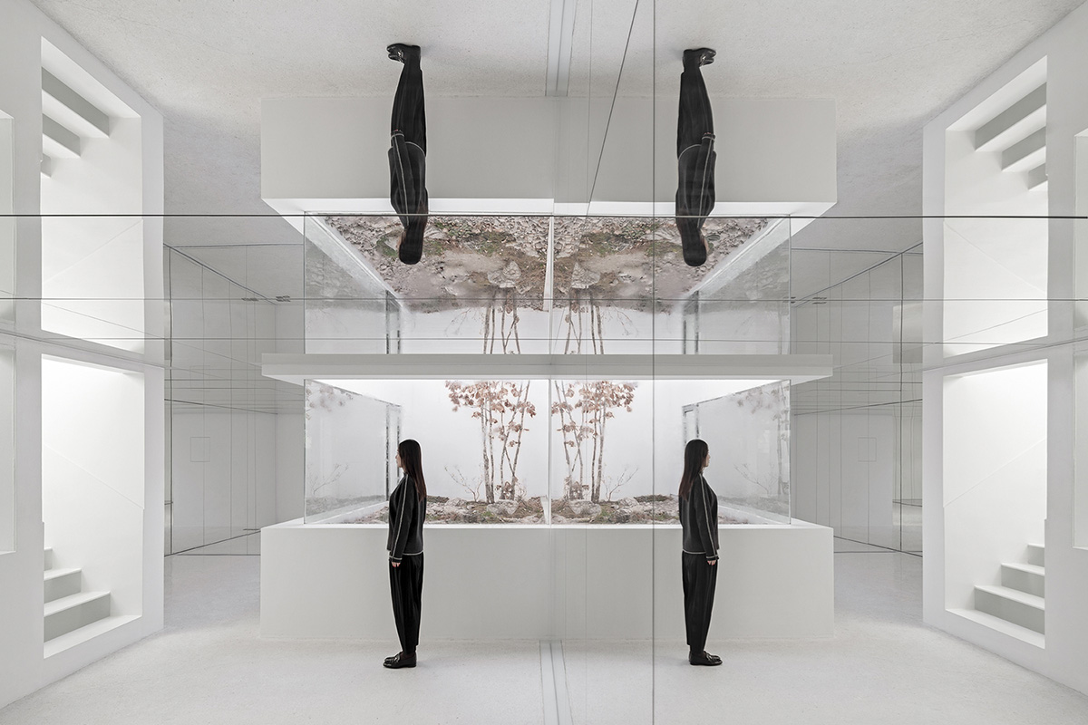 Archstudio transforms Beijing's old building into a multi-brand boutique with mirrored interior