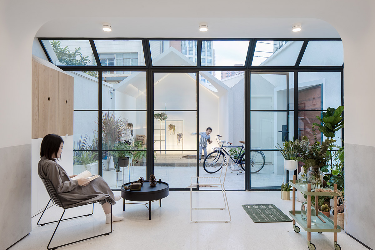 RIGI Design renovates Shanghai's historic house with punched holes and white colour palette