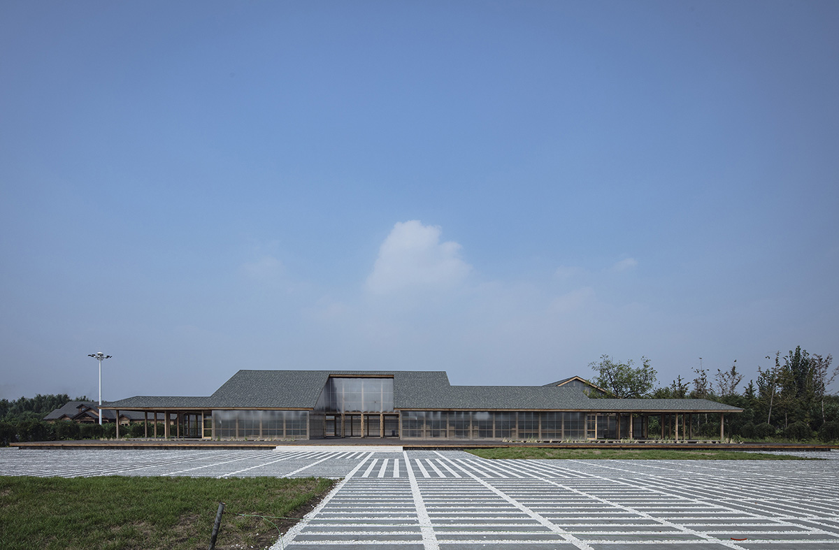 Arch Studio wraps this Organic Farm with translucent pc boards to easy food processing