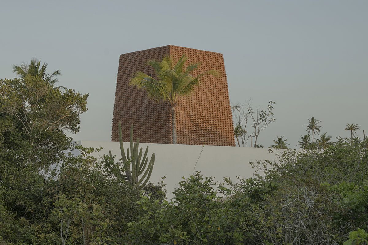 Atelier Matteo Arnone adds spacious brick tower to holiday home in Brazilian forest
