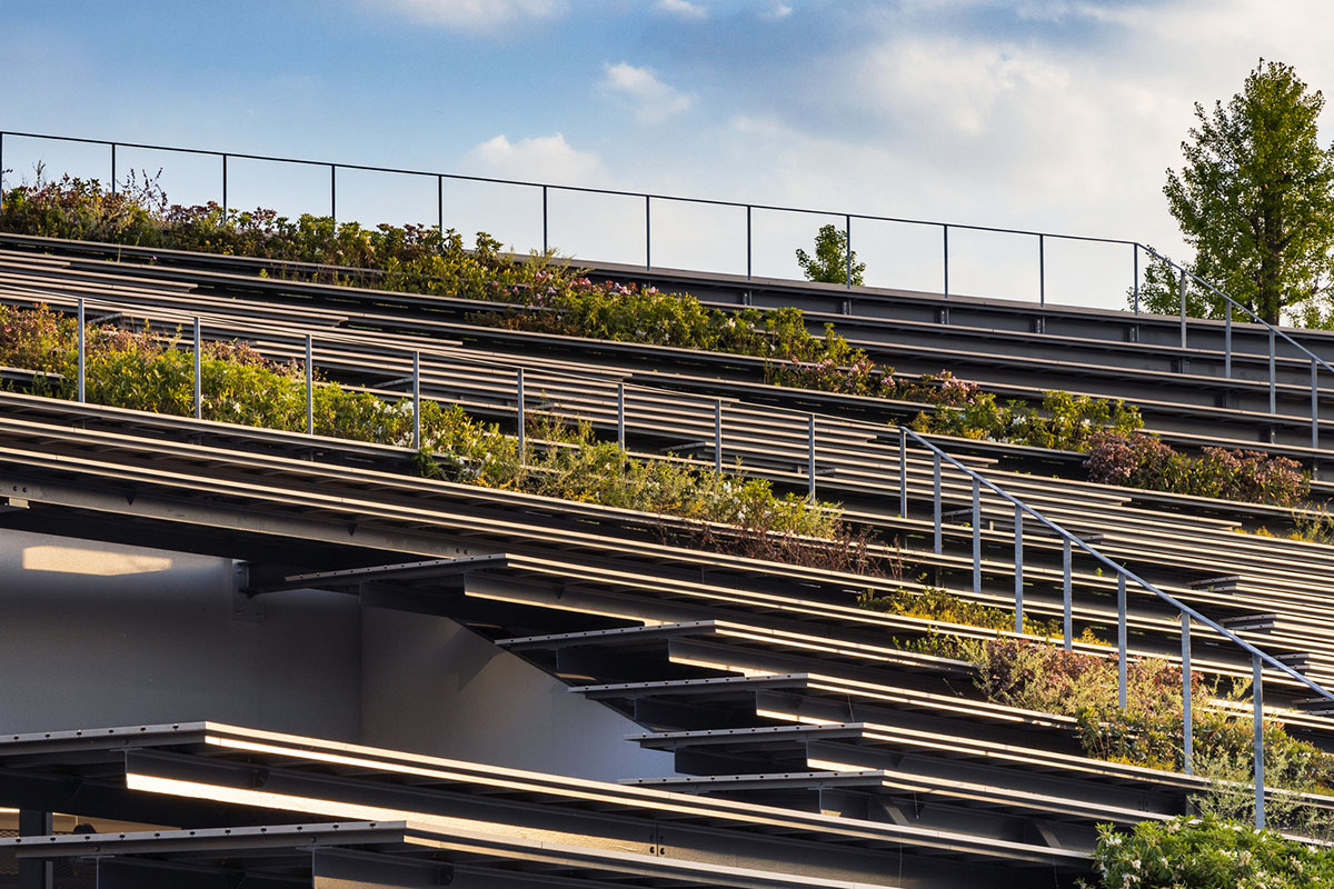 Kengo Kuma & Associates designs twisted student exchange hub featuring strip-like steps in Tokyo