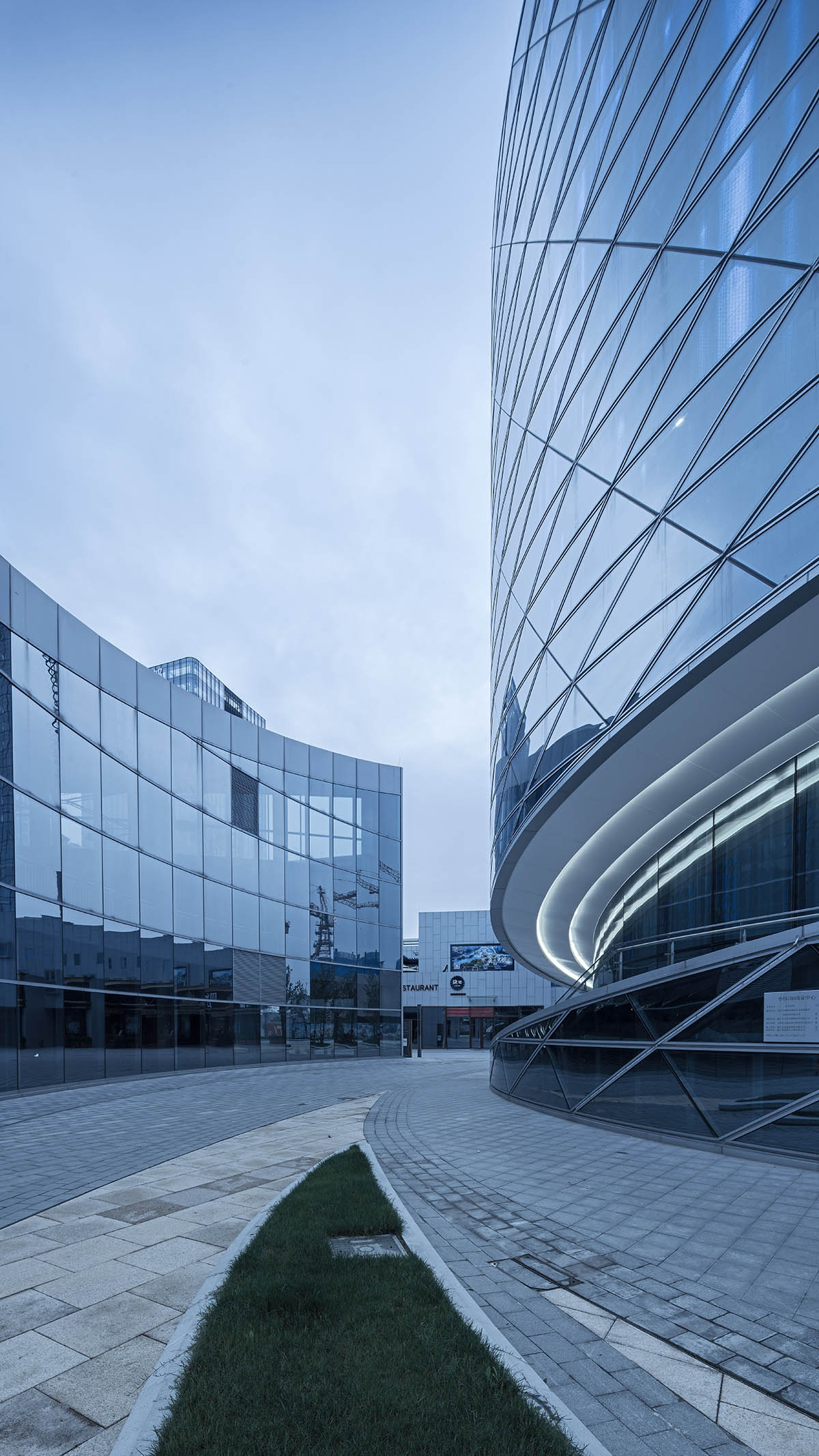 A Spiral Textile Center by Studio ATAH Adopts the Concept of Weaving