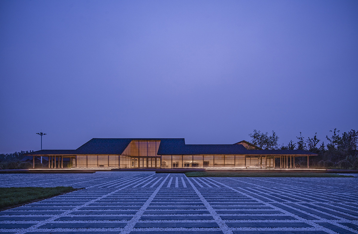 Arch Studio wraps this Organic Farm with translucent pc boards to easy food processing