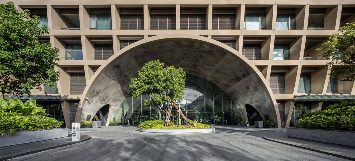Plan Architect built gridded hotel that features cave-like entrance in Thailand
