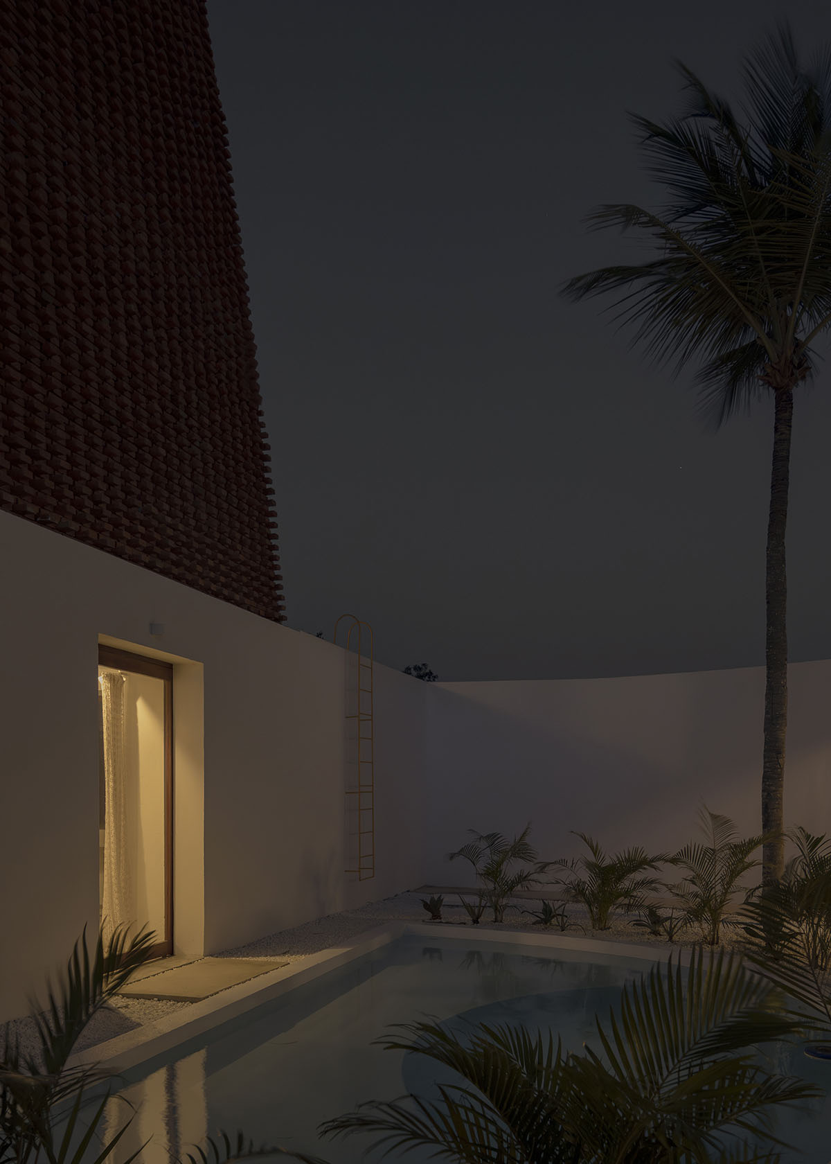 Atelier Matteo Arnone adds spacious brick tower to holiday home in Brazilian forest