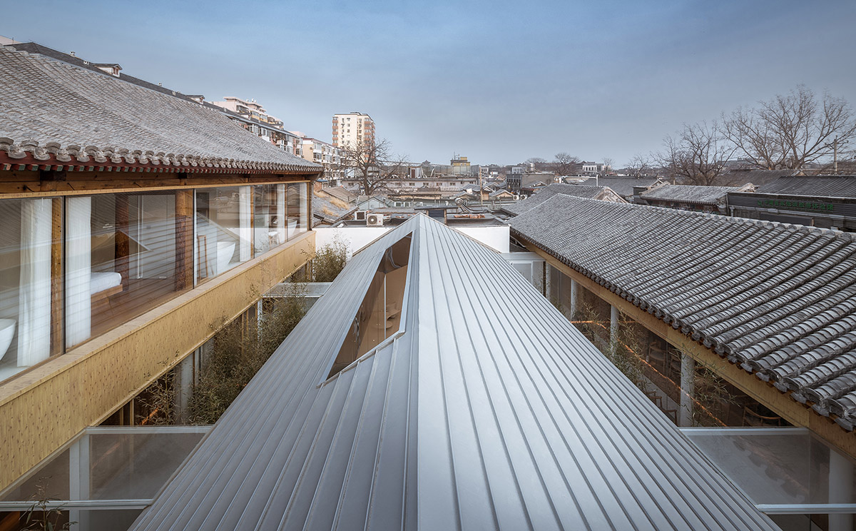 Archstudio converts Hutong's traditional commercial block into residences by 