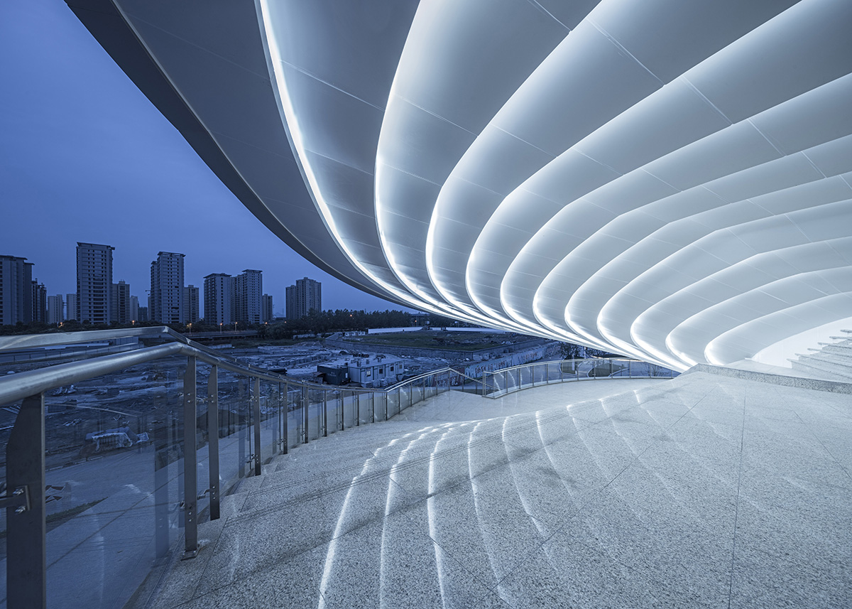 A Spiral Textile Center by Studio ATAH Adopts the Concept of Weaving