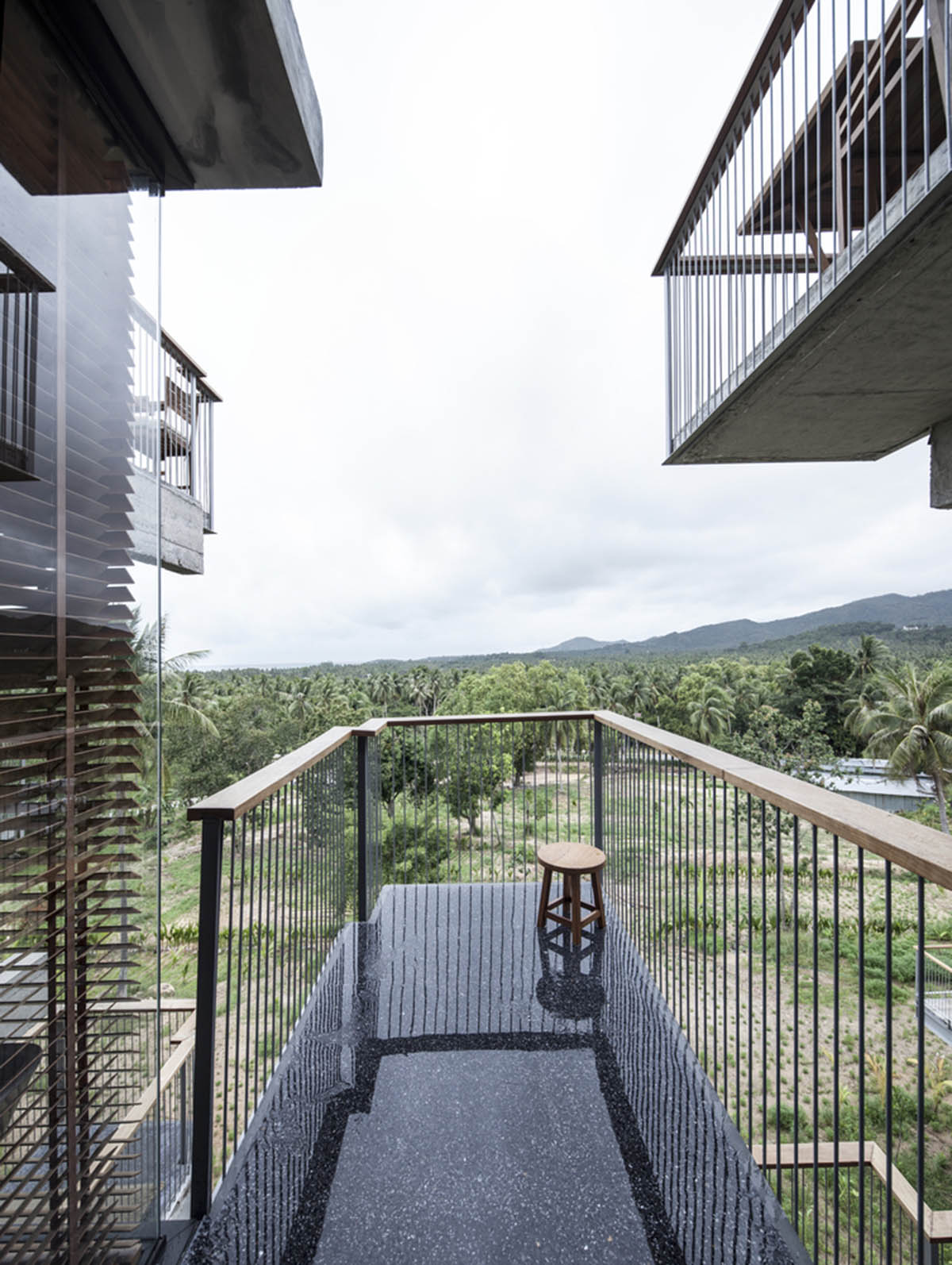 Patchara+ Ornnicha Architecture designs hotel with super elongated balconies on a serene hillside