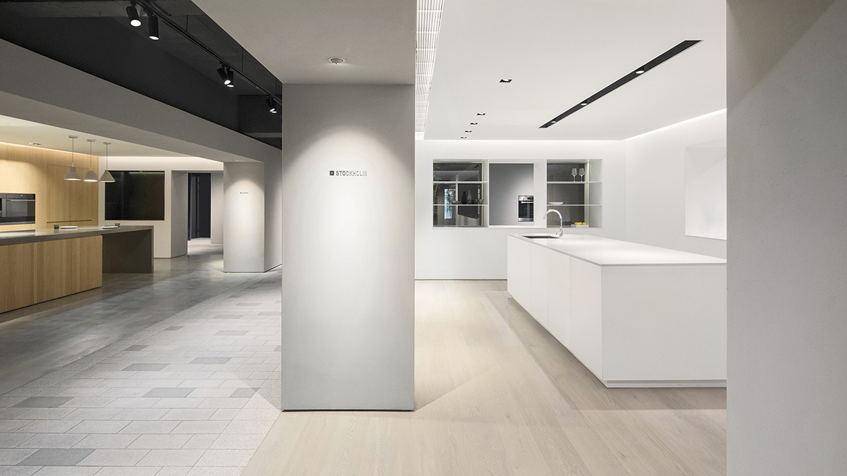 Lukstudio created artificial culinary village from different homes with monochrome interior