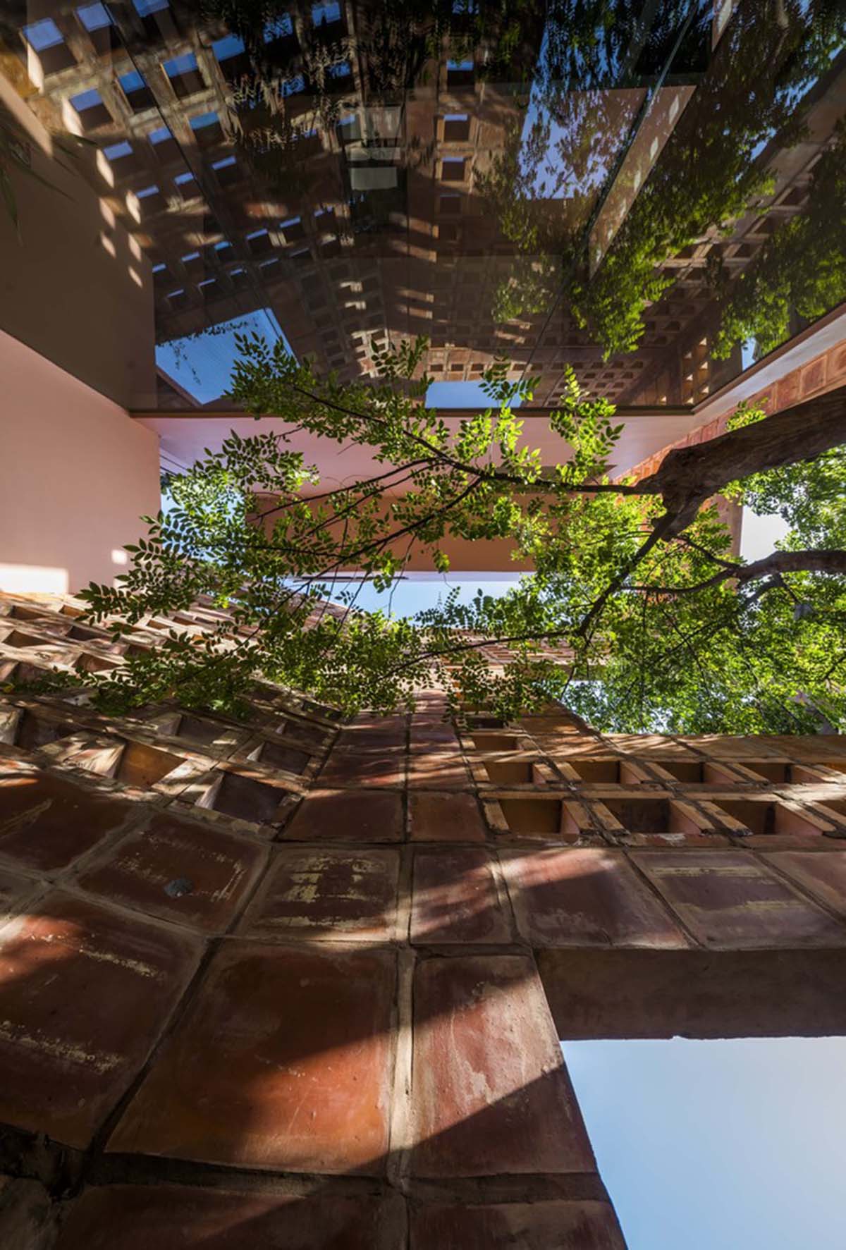 VTN Architects completes Bat Trang House with porous ceramic façade in Vietnam