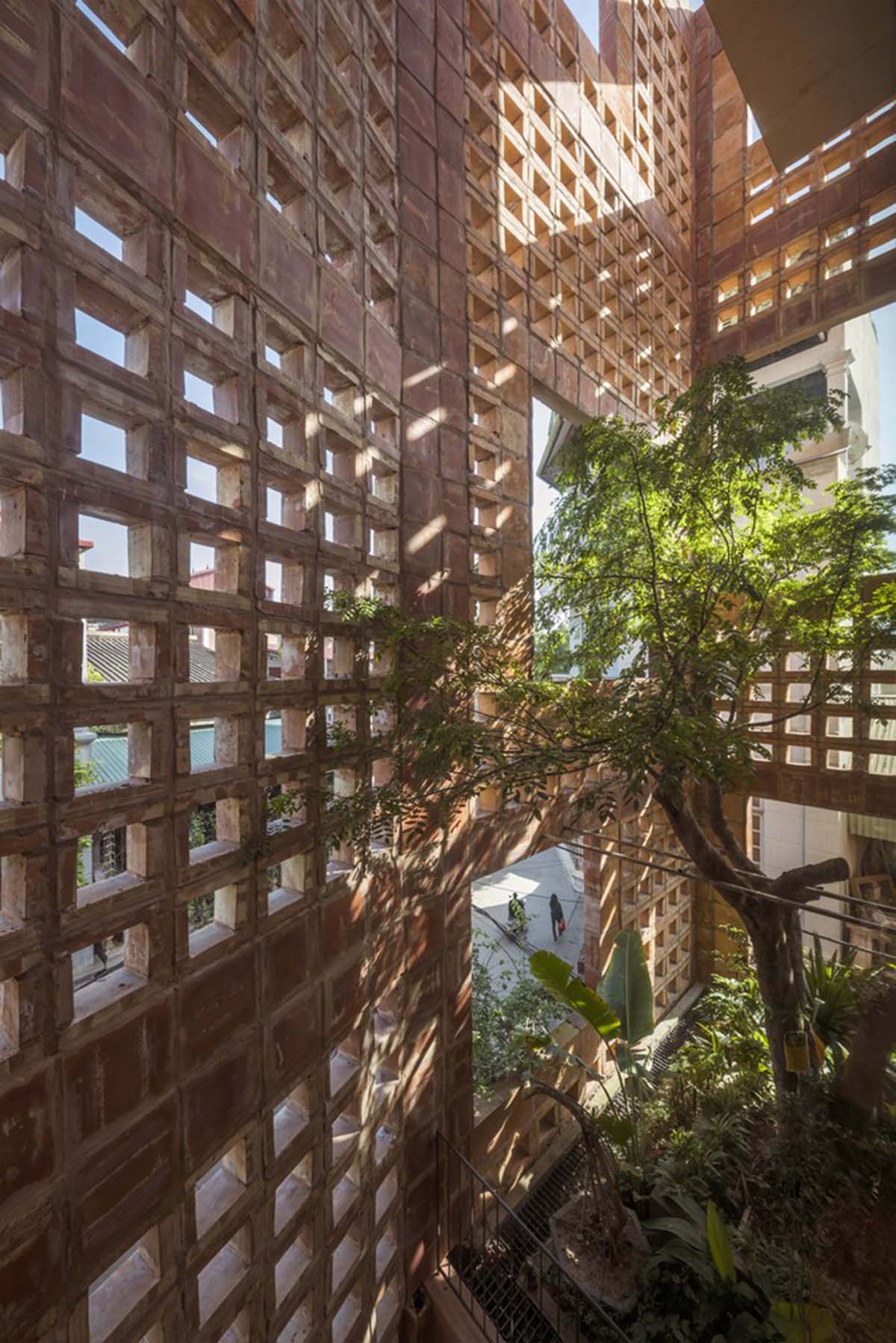 VTN Architects completes Bat Trang House with porous ceramic façade in Vietnam