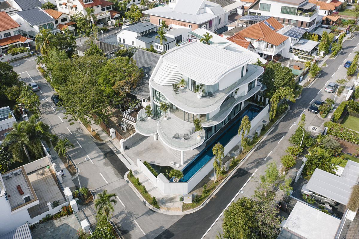 EHKA Studio's curvaceous residence features floating pods offering playful facade in Singapore