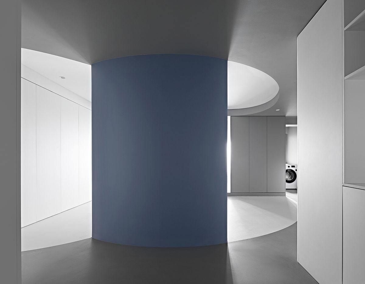 XIGO STUDIO creates gray and blue-colored interiors for apartment in Beijing 