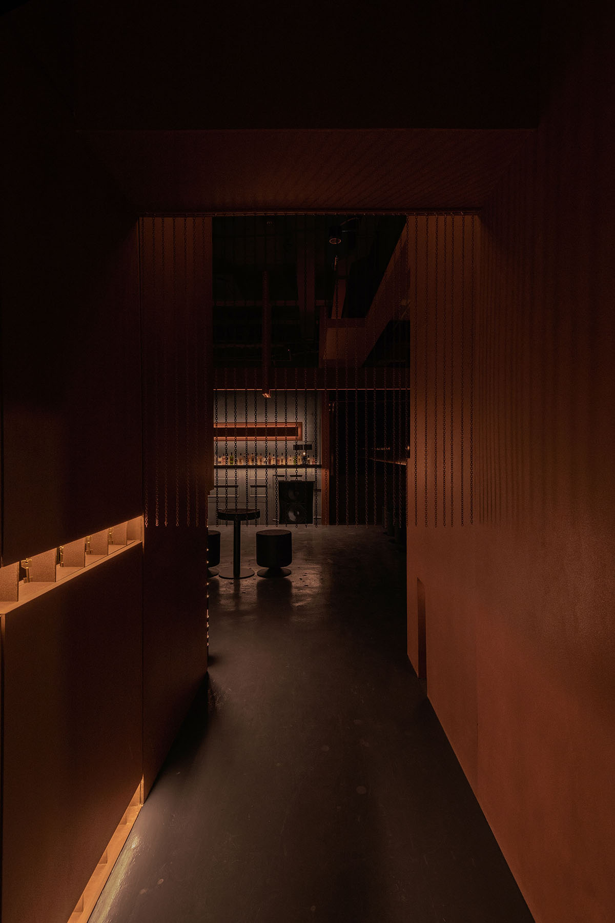 All Design Studio uses bold elements and soft lighting to create Lieben Bar in Shanghai