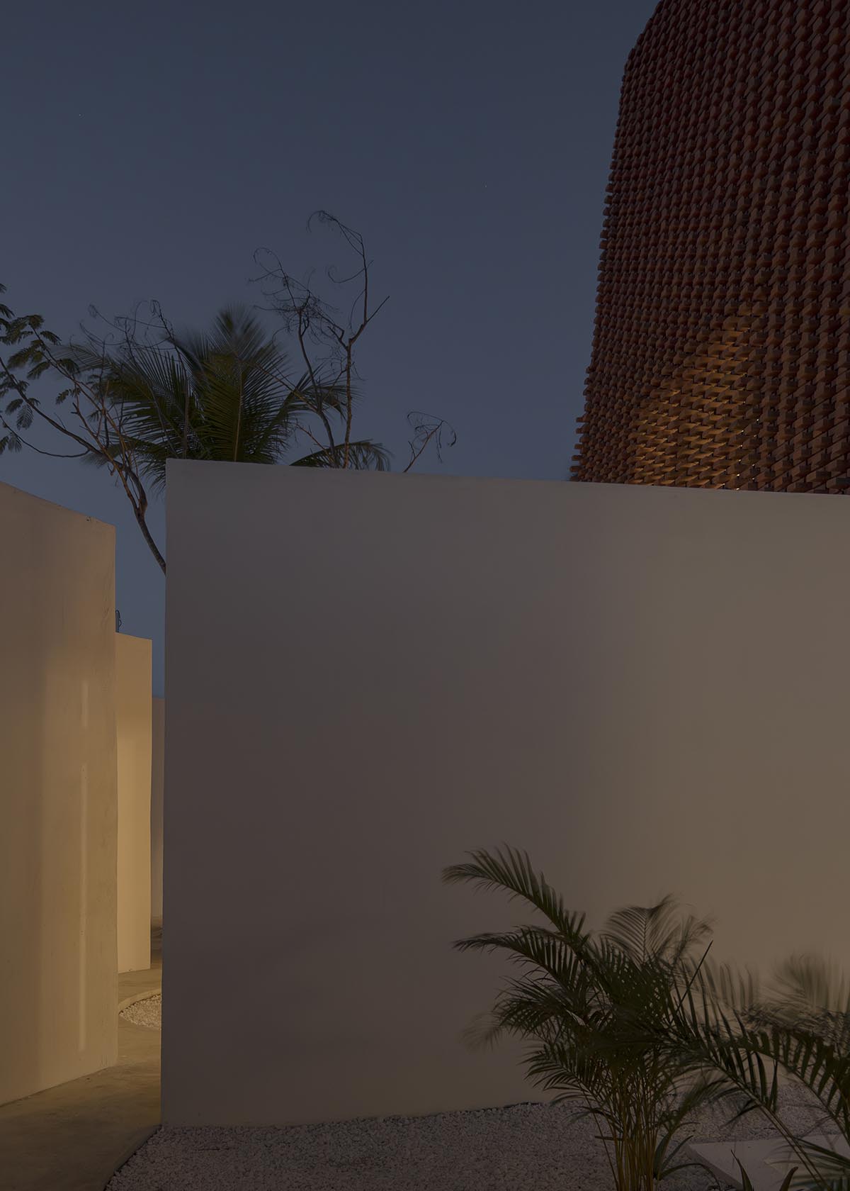 Atelier Matteo Arnone adds spacious brick tower to holiday home in Brazilian forest