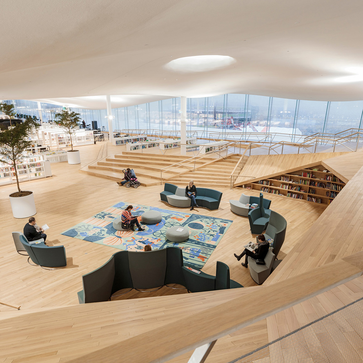 ALA Architects' cloud-like Oodi Helsinki Central Library is stretched with wooden volume