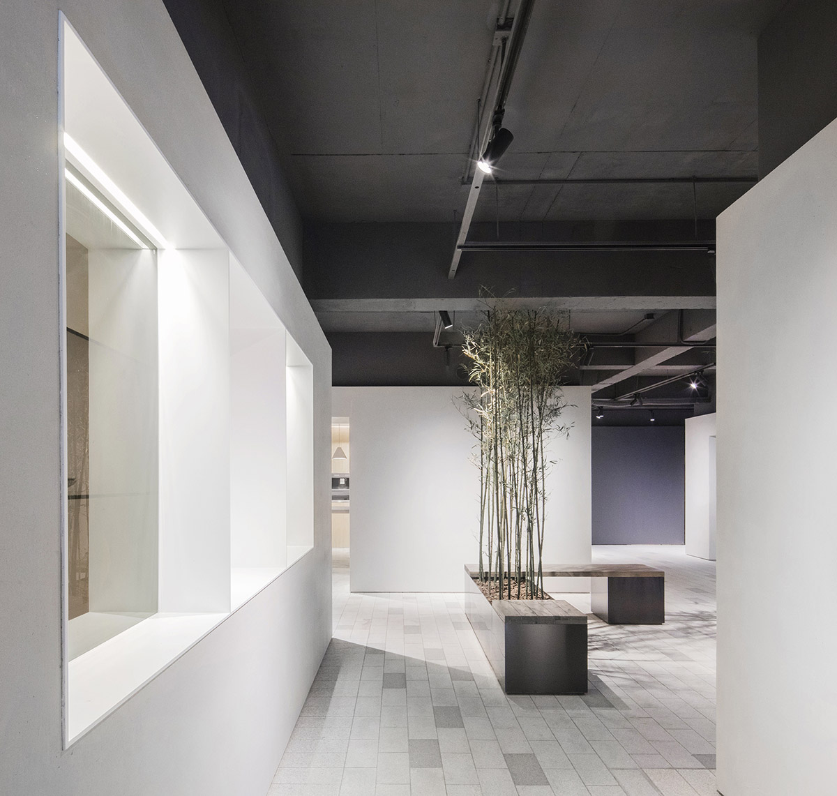 Lukstudio created artificial culinary village from different homes with monochrome interior