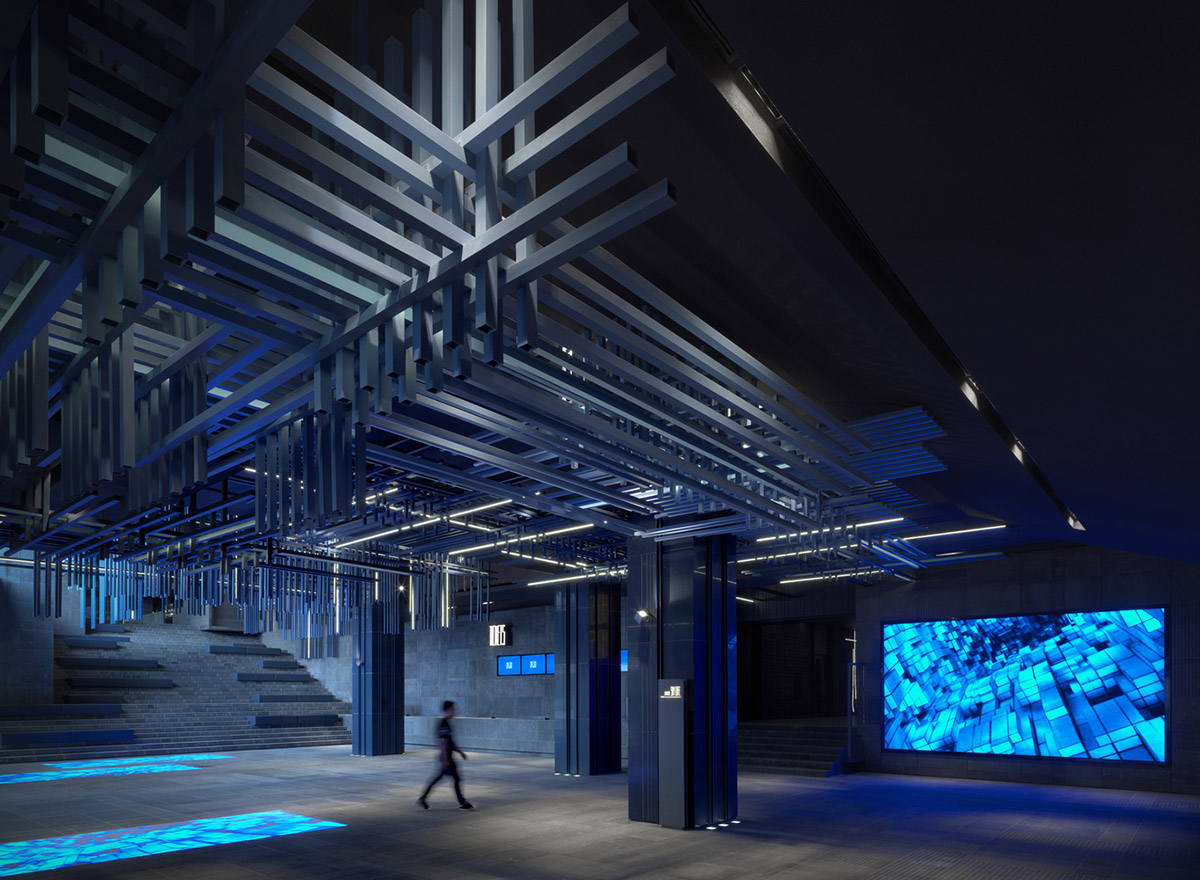 One Plus Partnership enhances depth of interior space with blue metal bars for a Cinema in Shenzhen