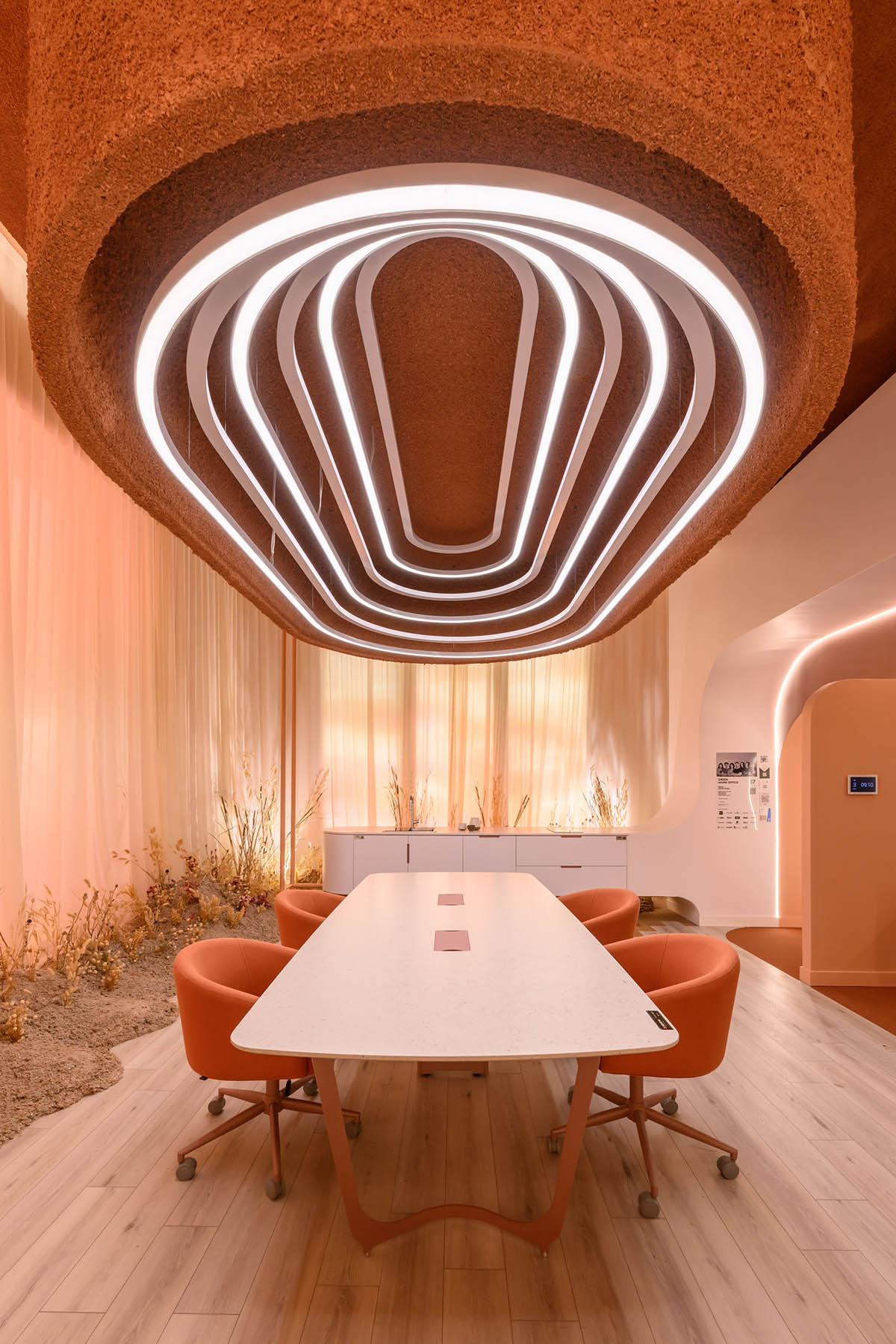 Estudio Ebras and Hause Möbel add orange hues and textures to home and office in Córdoba