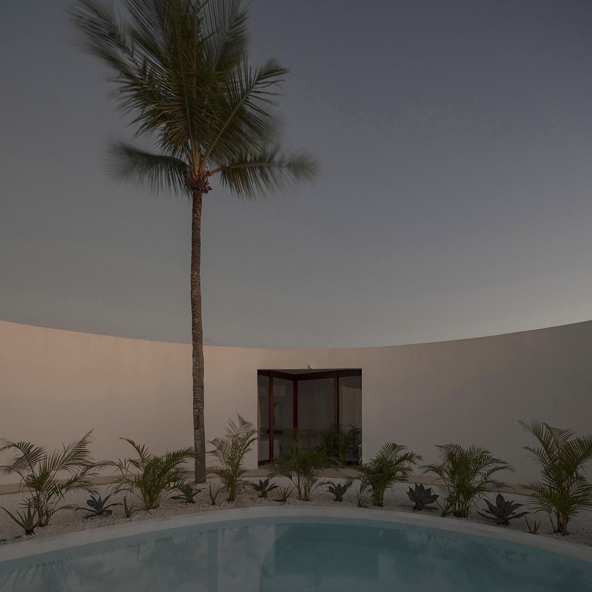 Atelier Matteo Arnone adds spacious brick tower to holiday home in Brazilian forest