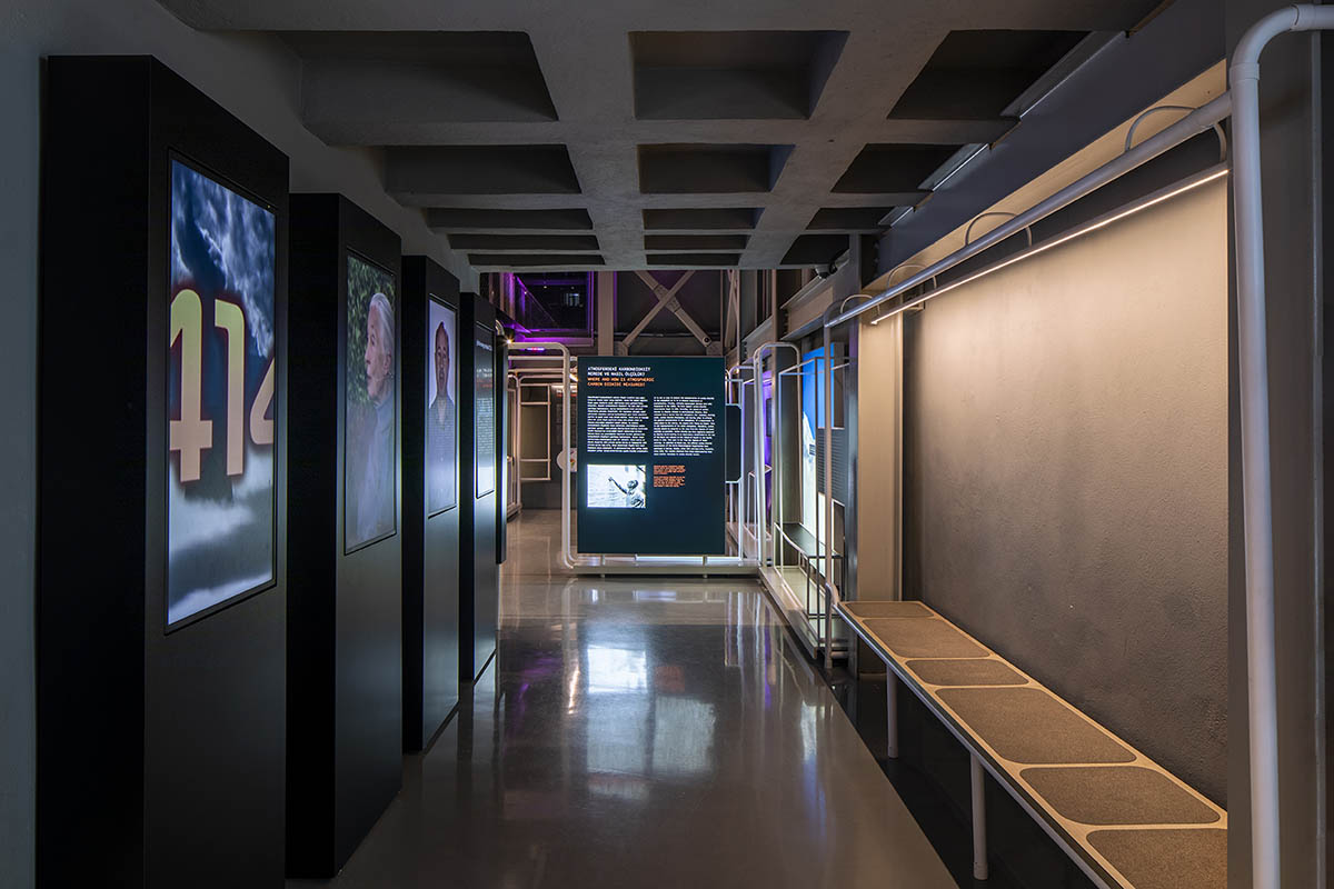 do[x]architecture softens robust industrial look of climate museum with colorful boards and lights