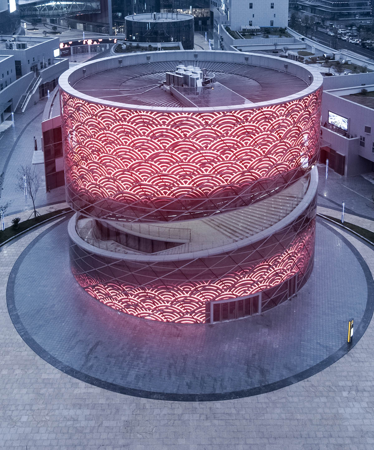 A Spiral Textile Center by Studio ATAH Adopts the Concept of Weaving
