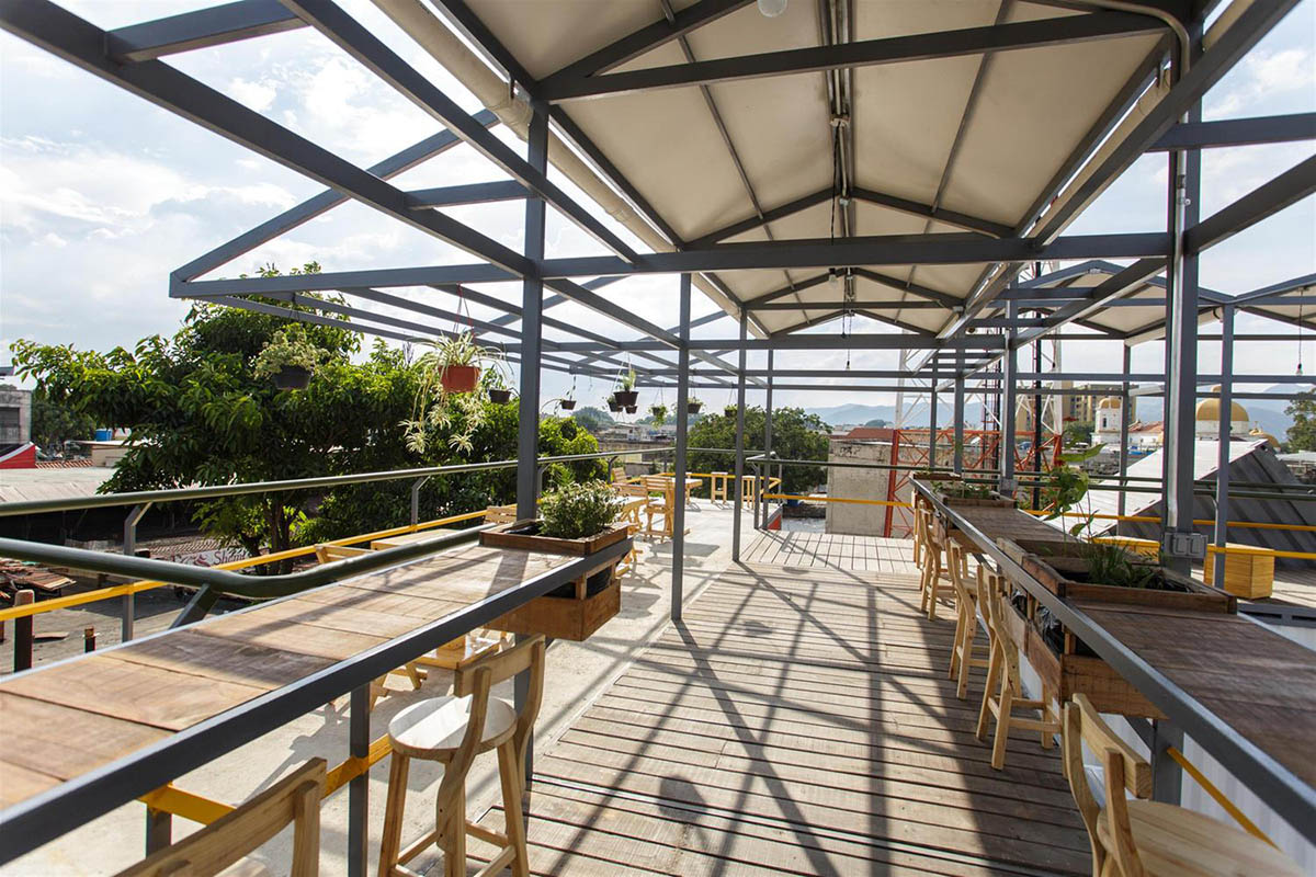 Pico Colectivo stacks colorful container units to design cultural production zone in Venezuela