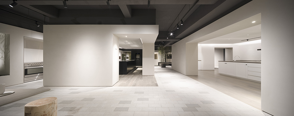 Lukstudio created artificial culinary village from different homes with monochrome interior