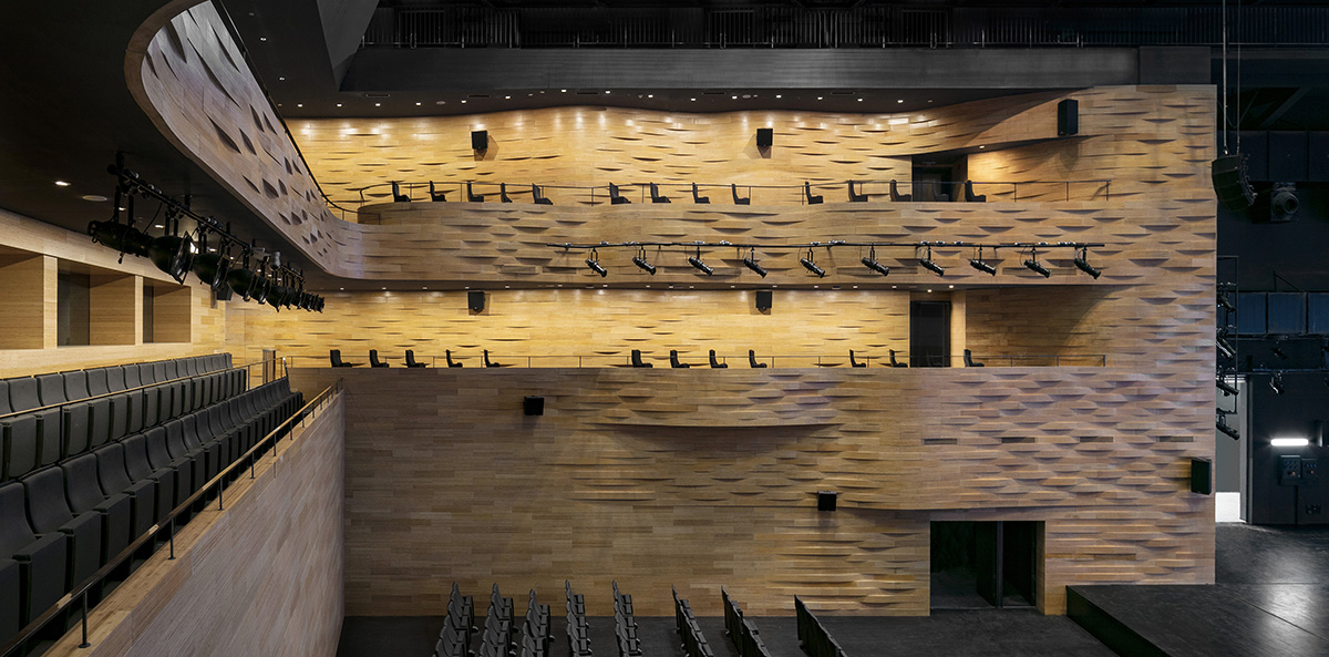 PES-Architects completes petal-shaped Culture and Art Centre in Fuzhou