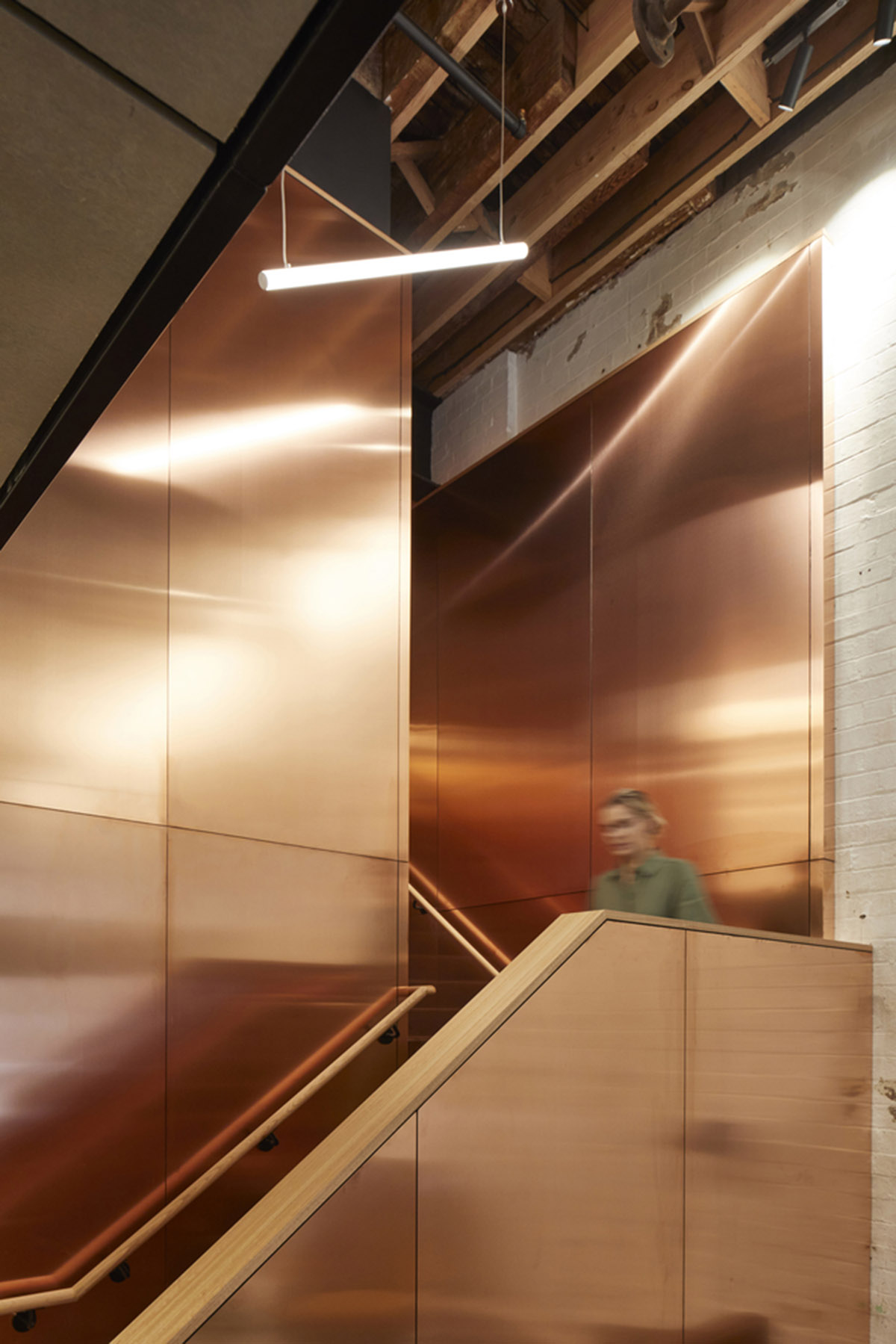 Make Architects adds copper-clad staircase to a new boutique office in Haymarket