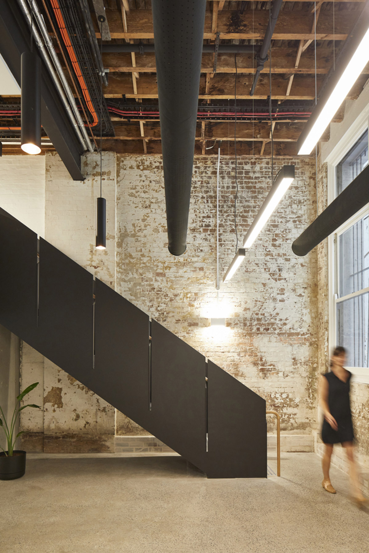 Make Architects adds copper-clad staircase to a new boutique office in Haymarket