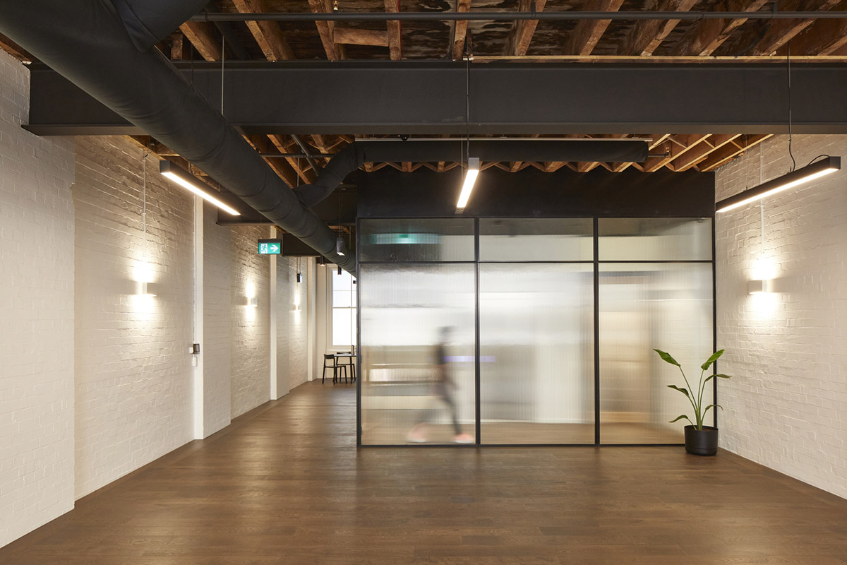 Make Architects adds copper-clad staircase to a new boutique office in Haymarket