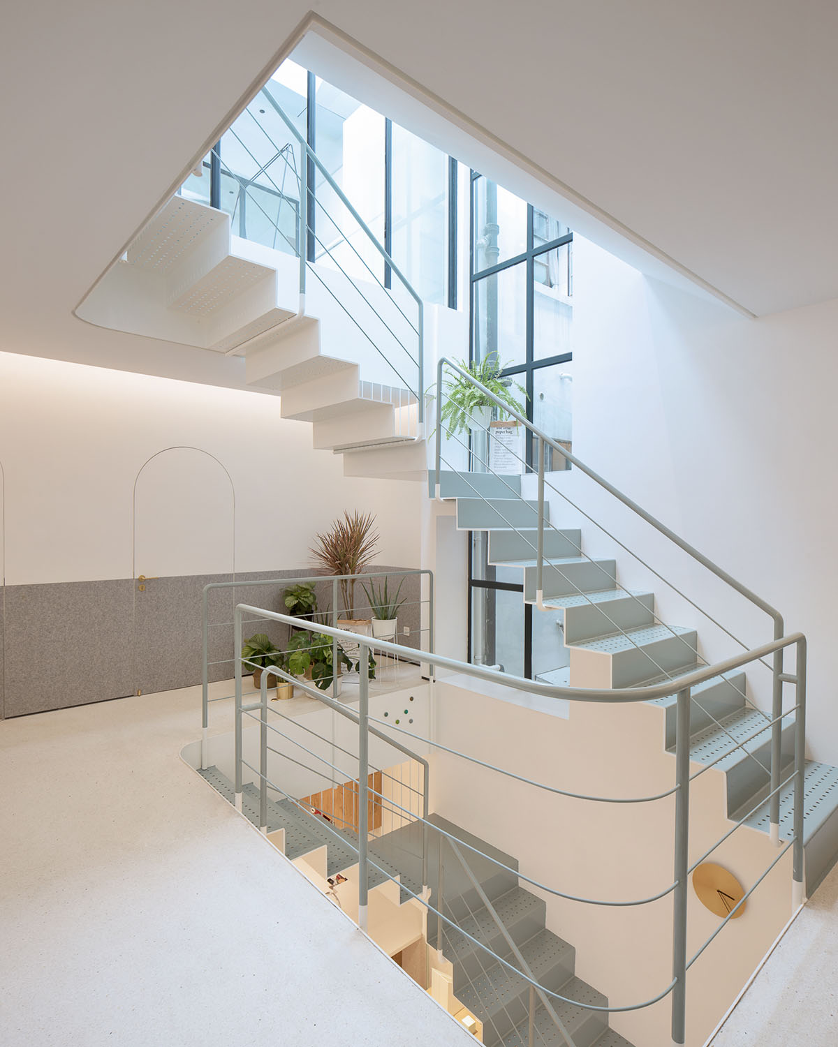 RIGI Design renovates Shanghai's historic house with punched holes and white colour palette