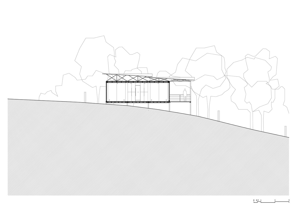 ŠA atelier designs linear black metal cabin to frame the view on natural terrain of Lithuania