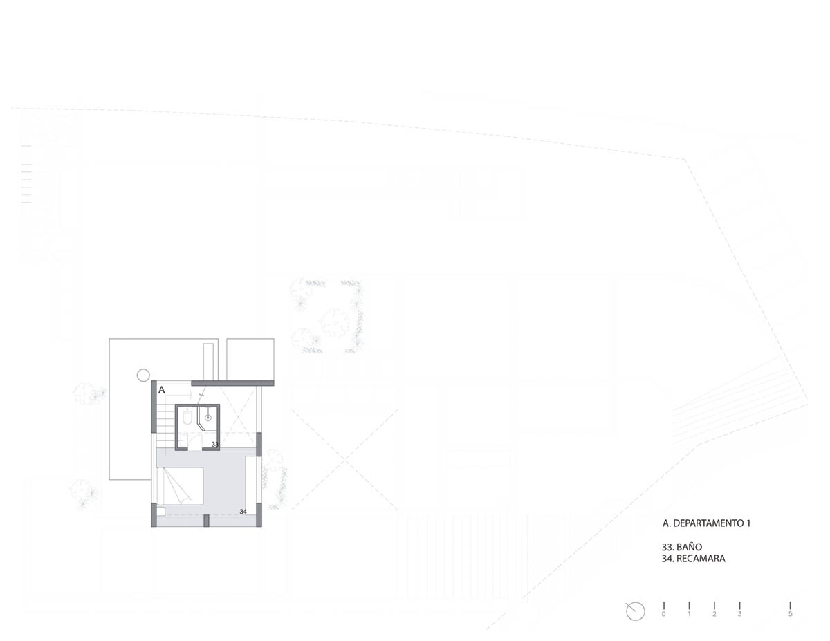 Earth-toned apartment building prioritizes views towards a forest in Coatepec, Mexico