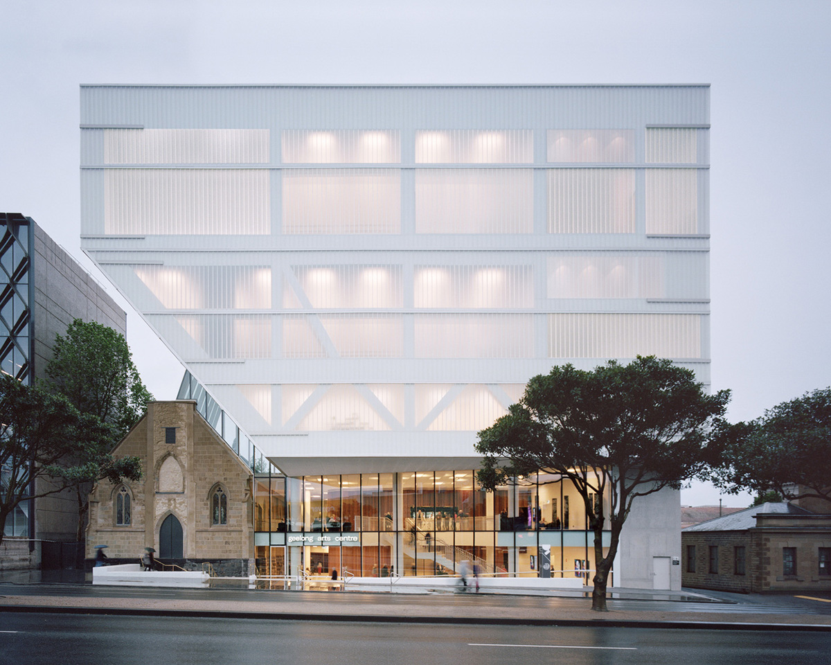 Hassell reveals Arts Centre with sliced translucent volume which is in dialogue with historic church