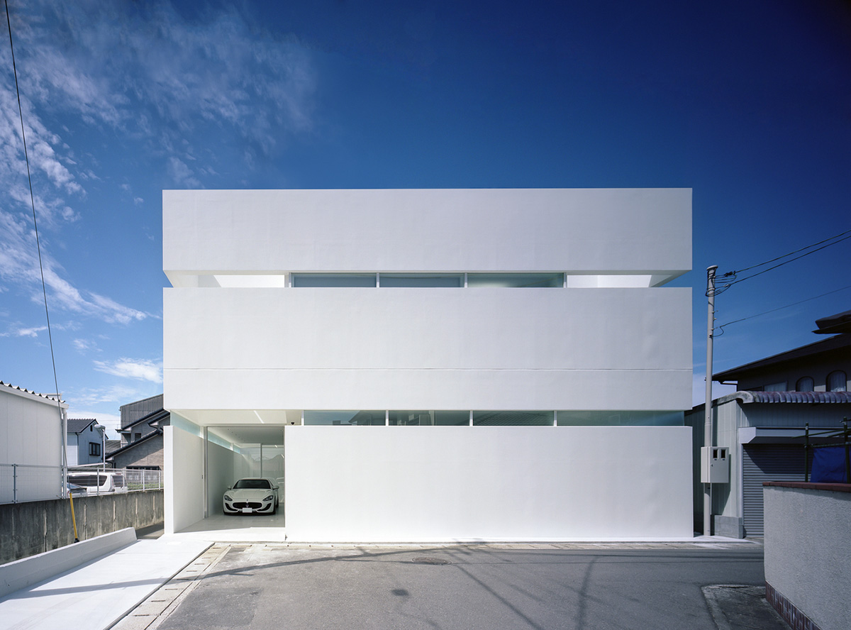 Fujiwaramuro Architects designs family house with thin skylights and transparent built-in garage