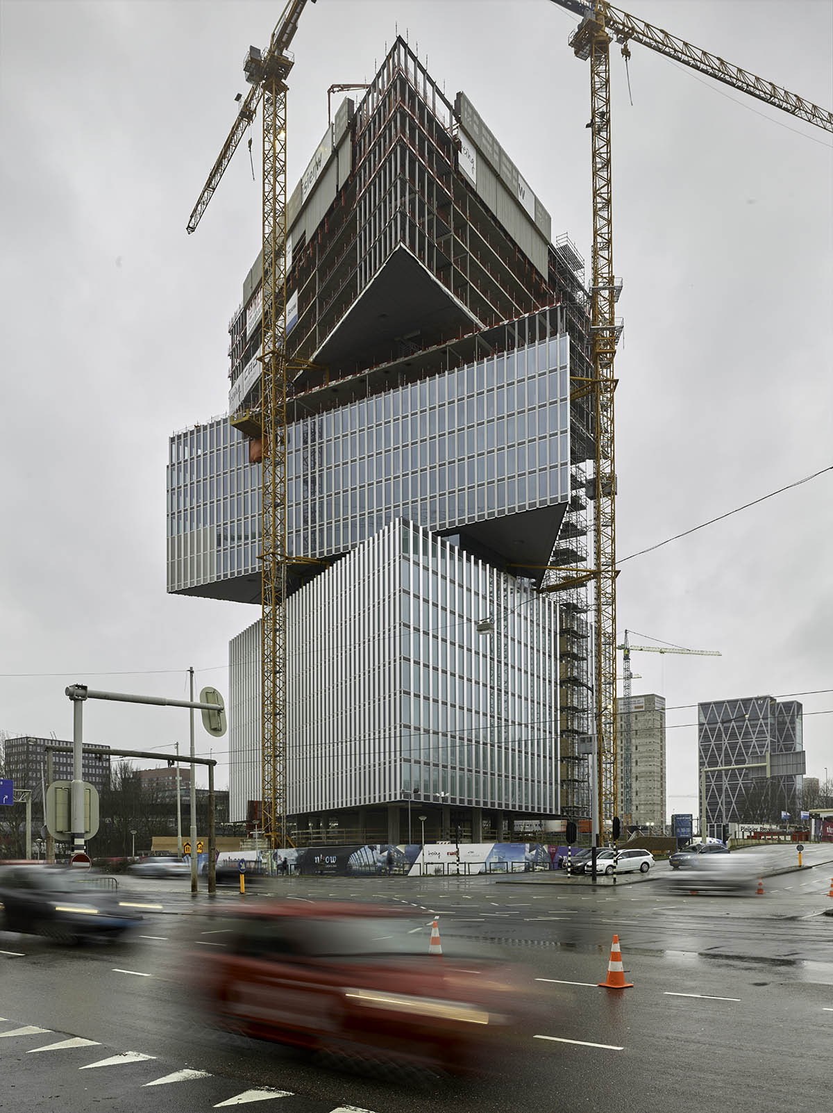 OMA's Nhow Amsterdam RAI hotel takes shape with mega triangular volumes