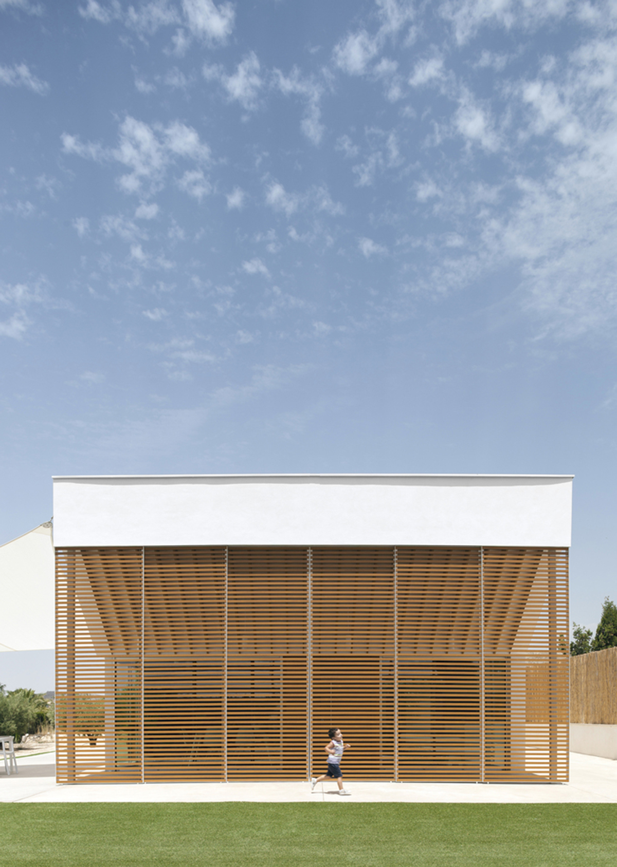 Pablo Muñoz Payá Arquitectos renovates former house with wooden shutters in Spain