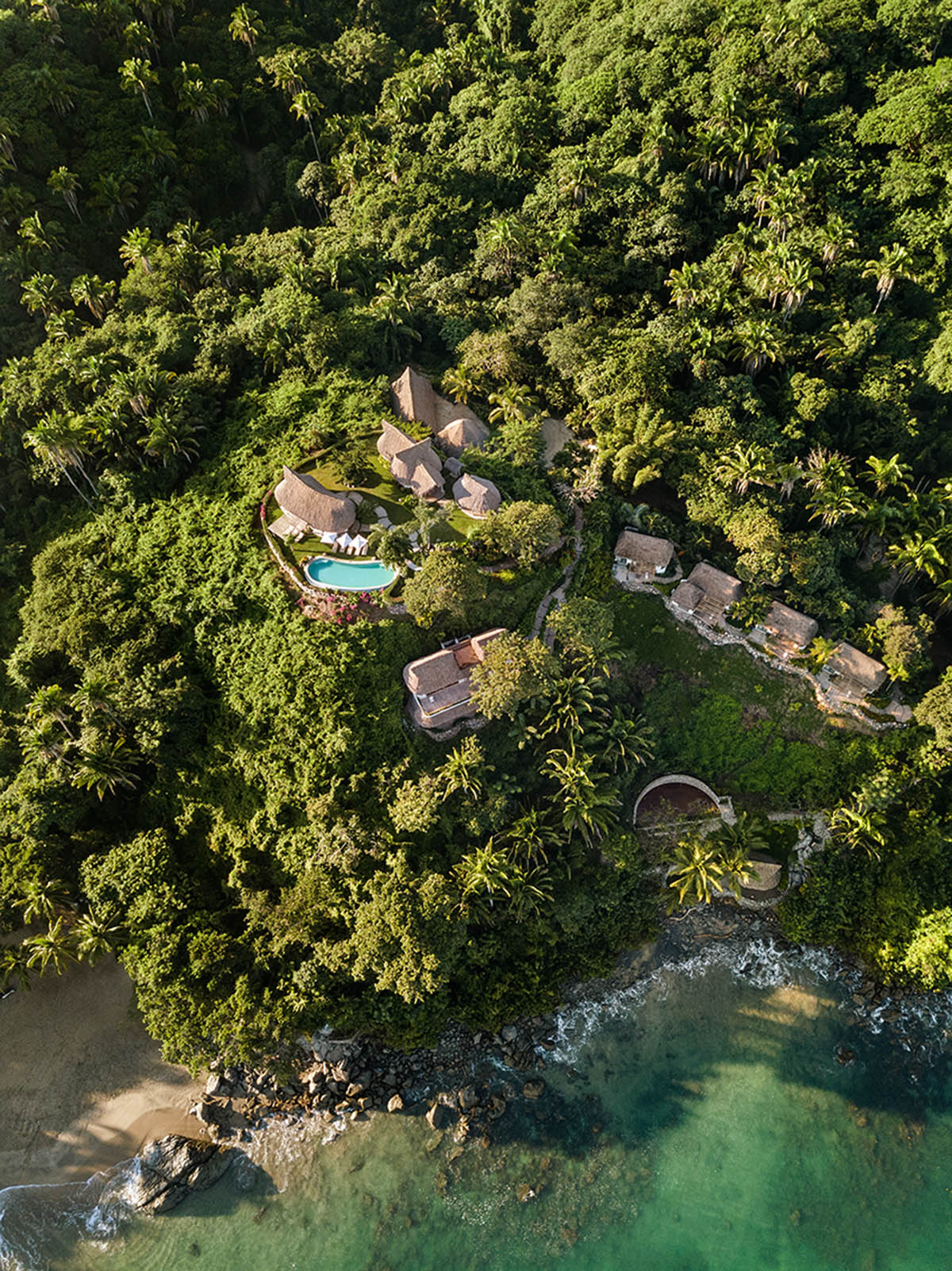 MAIN OFFICE adds half-circle yoga platform to thatched-roof guest villas in Sayulita, Mexico