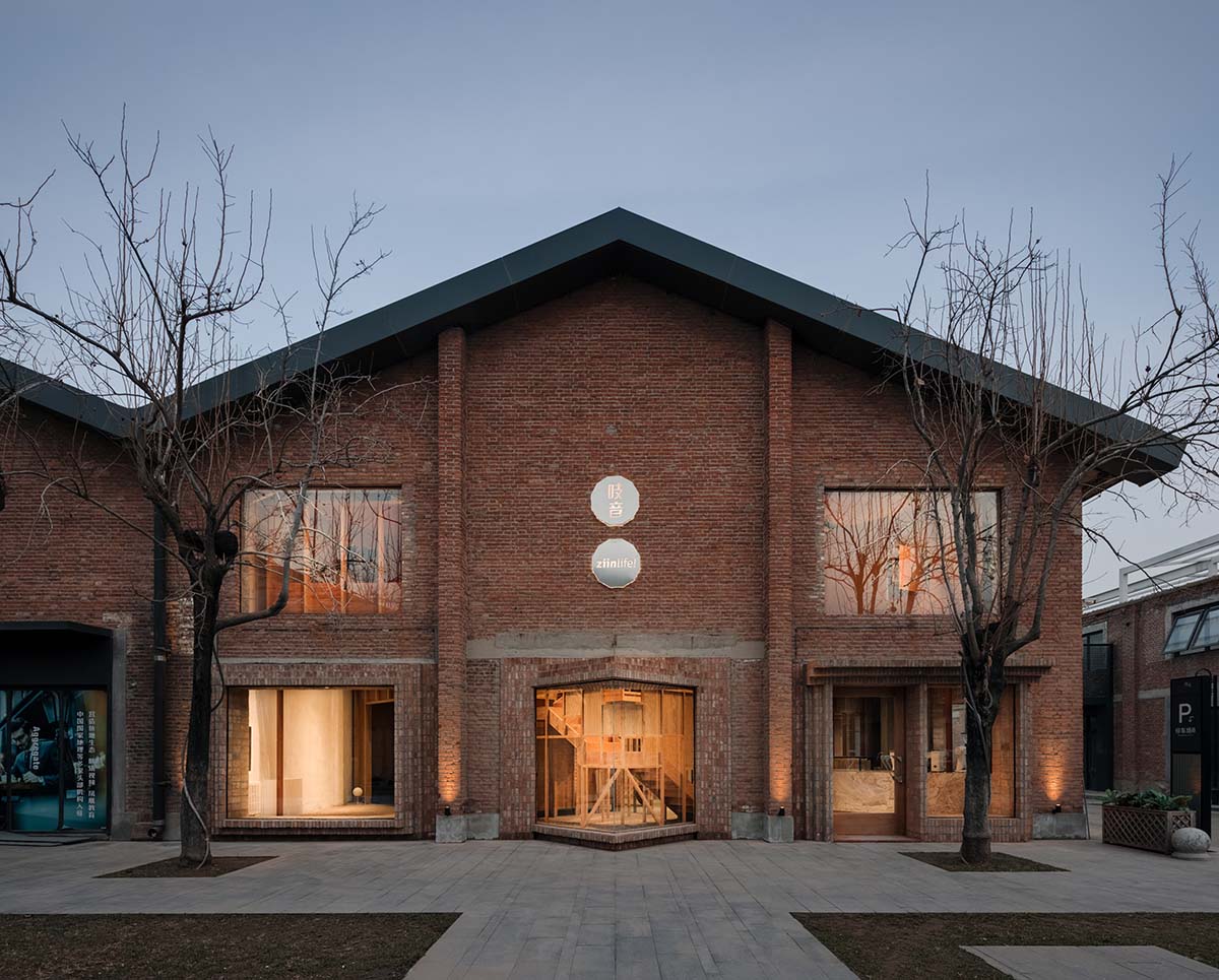 Atelier tao+c creates a crystal-like showroom with two stacked timber volumes in Beijing 