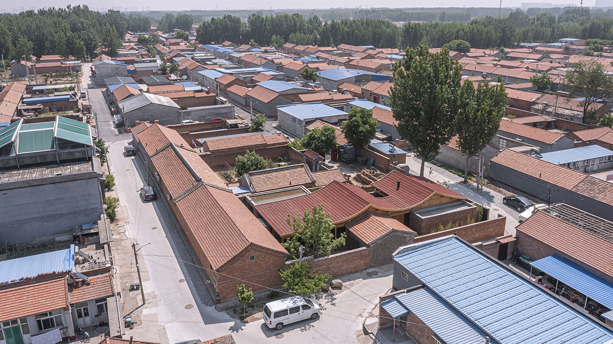 Archstudio renovates Beijing's old courtyard house with new wooden additions 