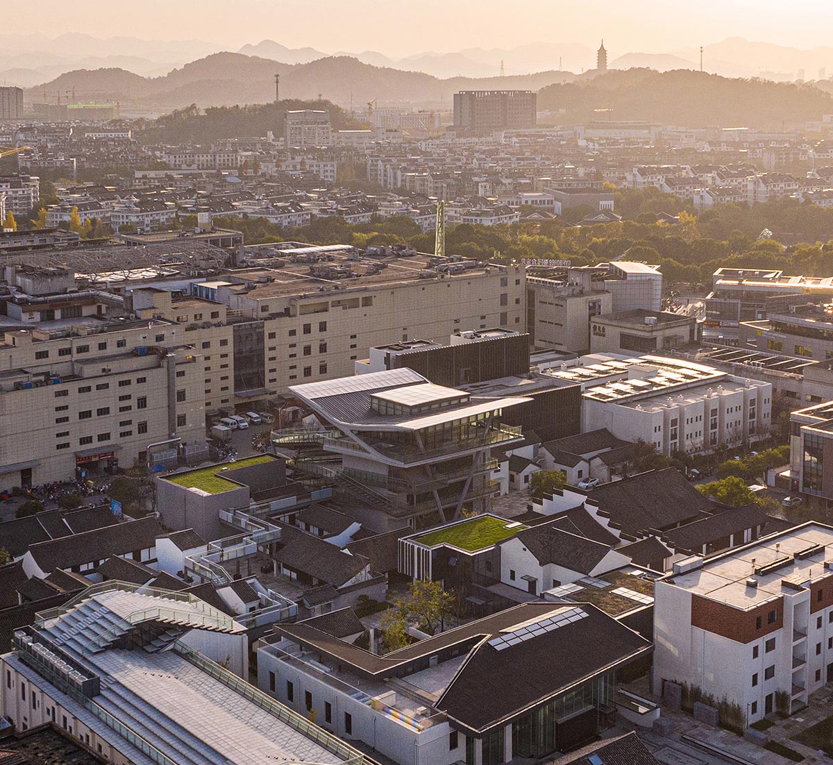 SpActrum completes cultural building with floating terraces and skywalks in Zhejiang, China 