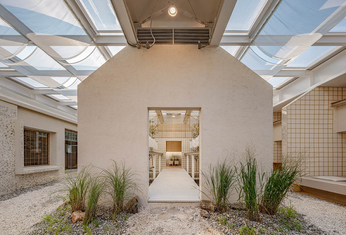 one-aftr converts old factory buildings into a fragmented cafe in South Korea