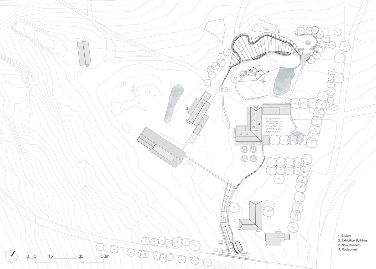 KLG Architects completes heritage center with undulating roof that acts as a small shelter