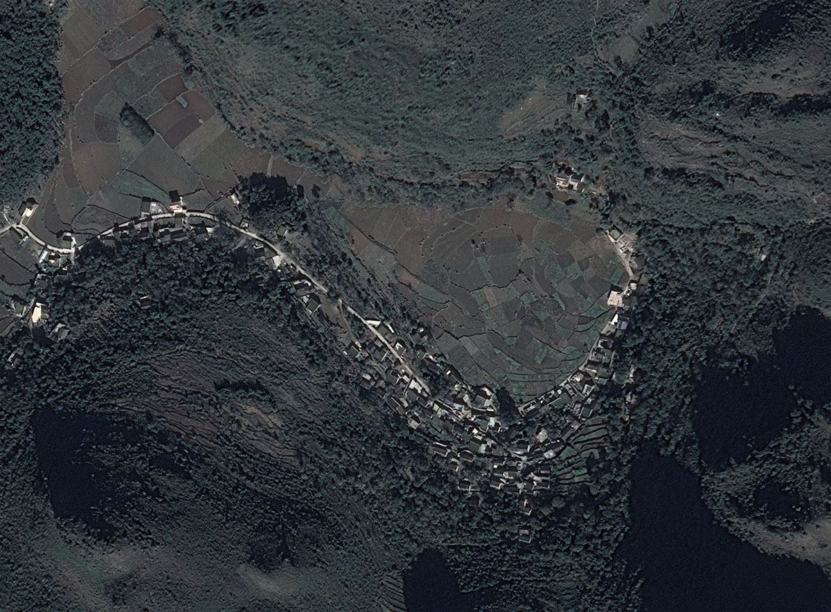 This 2,4-metre trumpet-flower-shaped sinkhole sustains rain fall cycles of Chinese old village